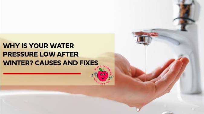 Closeup of woman holding her hand under a slow dripping sink faucet